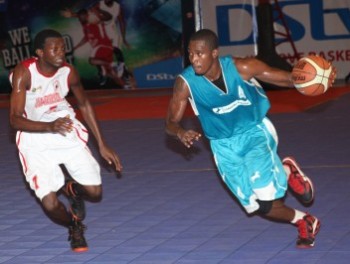 obum-onyia-in-jersey-no-13-of-union-bank-trying-to-dribble-roland-alalibo-in-jersey-no-16-of-dodan-warriors