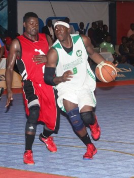 Adeola Olaiya of Kano Pillars dribbles Akpara Akita of Mark Mentors in jersey no 9 PHOTO CREDIT AKINKUMI FARINTO