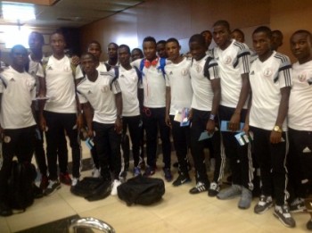 Nwakali (middle) with Golden Eaglets shortly before their departure at MMA