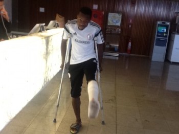 Onazi shows his injured left leg on Tuesday afternoon