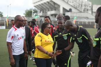 The Marketing  Manager GOtv, Oludare Kafar, Executive Business Director, Noah’s Ark Communications, Victor Oyarero and the General Manager GOtv, Mrs. Elizabeth Amkpa exchanging pleasantries with match officials during the semi-finals of the GOtv Hood to Hood Football Championship.