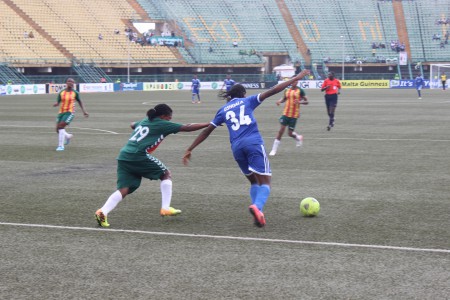 Asisat Oshoala Going for Goal against sunshine stars of Akure During the Finals of the Fed Cup 2014
