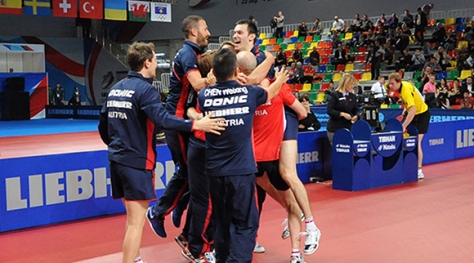 Austria celebrates their team victory at the ITTF-European Championships.