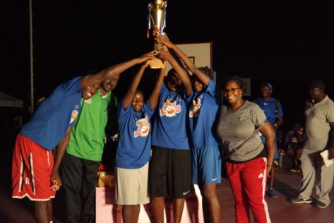 Coach Stanley Gumut and his championship Team and AdaMark Ogbole CEO AdaMark Foundation for Girls.