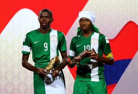 VINA DEL MAR, CHILE - NOVEMBER 08:  Kelechi Nwakali (R) of Nigeria poses with the adidas bronze boot and team mate Victor Osimhen of Nigeria poses with the adidas golden boot after the FIFA U-17 Men's World Cup 2015 final match between Mali and Nigeria at Estadio Sausalito on November 8, 2015 in Vina del Mar, Chile.  (Photo by Martin Rose - FIFA/FIFA via Getty Images)